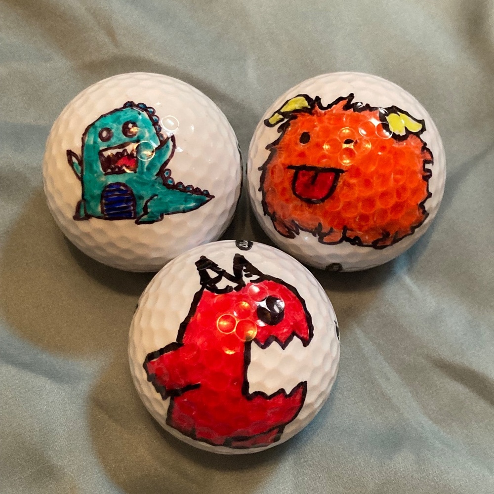 Hand drawn monster golf balls